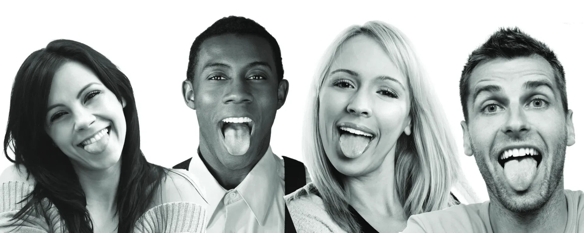 group A man and woman sticking out their tongue.